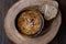 Turkish Traditional Vermicelli Soup in a wooden bowl / Tel sehriye corbasi.