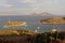 Turkish wooden boats and yachts mooring in a rocky cove of the Aquarium Bay near Bodrum in Turkey.