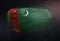 Turkmenistan Flag Made of Metallic Brush Paint on Grunge Dark Wa