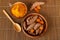 Turmeric roots and powder on bamboo napkin Top view, overhead shot