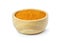 Turmeric or tumeric powder in wooden bowl isolated on white