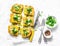 Turmeric, zucchini, mashed chickpeas tortilla with herbs on a light background, top view. Delicious appetizers