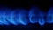 Turn on the gas burner with a blue flame. Close up