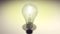 Turn on light bulb. Tracking shot of very detailed light bulb. Bright Light Ideas