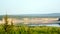 The turn of the Northern Yakut river vilyu reflected among the steep banks of the hills and spruce forest