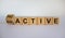 Turned a cube and changed the word reactive to proactive. Business concept. Beautiful white background, copy space