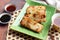 Turnip cake in Chinese called Lo Bak Go - Chinese food on the wooden background at top view