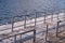 Turnstiles at the Ustinsky bridge pier for summer pleasure boats on Moskvoretskaya embankment, winter, deserted, Moscow