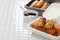 Turon, filipino banana spring rolls in takeaway container