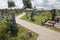 Turov, Belarus - August 7, 2016: place of worship pilgrims growing stone cross in a cemetery in the town of Turov, Belarus.