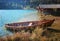 turquoise alpine lake lautersee with moored rowing boat an boathouses