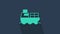 Turquoise Cargo ship with boxes delivery service icon isolated on blue background. Delivery, transportation. Freighter
