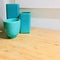 Turquoise ceramic vases decorating a table