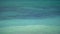 Turquoise clear sea water with wave comes in slow motion