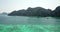 Turquoise clear water. Yachts, boats floating. Water Gradient from light to dark blue. Phi Phi don island.