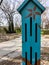 Turquoise colored birdhouse