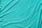 Turquoise creased cotton fabric background texture