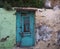 Turquoise Door With Green And Beige Walls