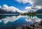 Turquoise Garibaldi Lake reflects mountains & trees, Whistler