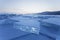 Turquoise ice floe. Winter landscape of Baikal lake