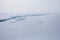 Turquoise ice floe. Winter landscape. Baikal lake