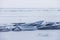 Turquoise ice floe. Winter landscape. Baikal lake