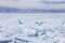Turquoise ice floes. Baikal lake winter landscape