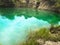 Turquoise Jade Lake at Noon. Blue Green Pond Near Abandon Dolomite Mineral Mining Site