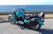 Turquoise Kawasaki Vn 800 Classic parked by the sea