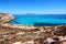 Turquoise lagoon near Cala Rossa beach in Sicily