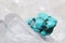 Turquoise laid on druze of quartz