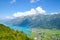 Turquoise Lake Brienz in Interlaken, Switzerland from above from Harder Kulm. Amazing Swiss landscape. Green hills, Swiss Alps.