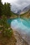 Turquoise lake and mountains.