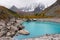 Turquoise lake and mountains.