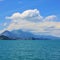 Turquoise Lake Thun. Mount Stockhorn surrounded by clouds. Villa
