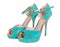 Turquoise leather sandals with high heels isolated