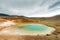 A turquoise pond near the Viti in the Krafla volcano area in Ice