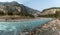 Turquoise river with an amazing mountains