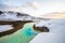 Turquoise River Snakes in front of the Krafla Geothermal Power Station in Iceland