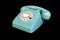 Turquoise rotary dial seventies telephone