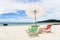 Turquoise sea, deckchairs, white sand