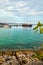 Turquoise sea, harbor with old traditional sailing ships in Sithonia, Halkidiki Peninsula, Greece,