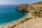 The turquoise sea laps the shore at Rijana Beach, Spain