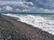 Turquoise sea and pebbly beach. Pitsunda, Abkhazia