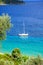 Turquoise sea and a sailing boat, Greece