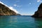 Turquoise sea tranquil cove beneath blue sky Corfu, Greece