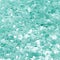 Turquoise shiny texture, sequins with blur background