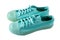 Turquoise sneakers isolated. A pair of mint shoes. Sports shoe.