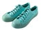 Turquoise sneakers isolated. A pair of mint shoes. Sports shoe.