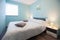 Turquoise Tranquility: Serene Bedroom Retreat